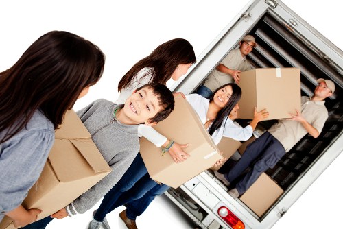 Packing boxes and protective materials arranged for a Brent home move