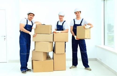 Trained movers handling furniture with care in Brent