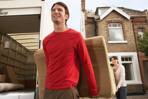 Careful loading of household furniture during a Brent same day move