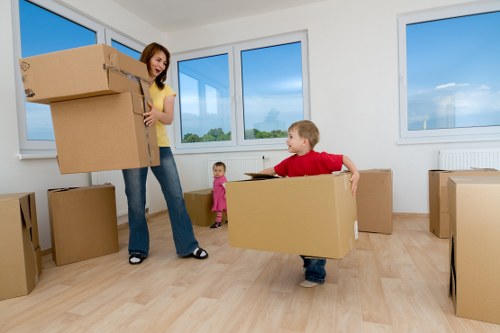 Household boxes and furniture prepared for a flat move in Brent