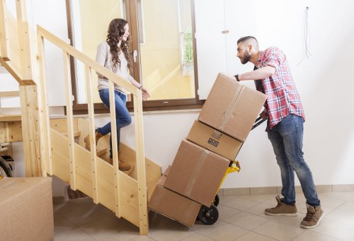 Professional packing service preparing fragile household items in Brent