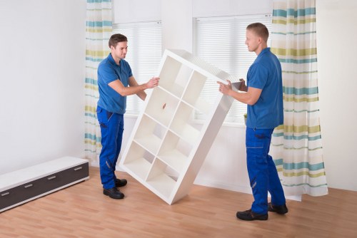 Careful furniture loading into a removal van in Brent