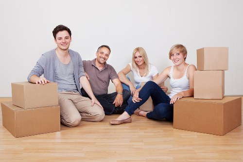 Movers handling access challenges such as stairs and narrow hallways in Brent